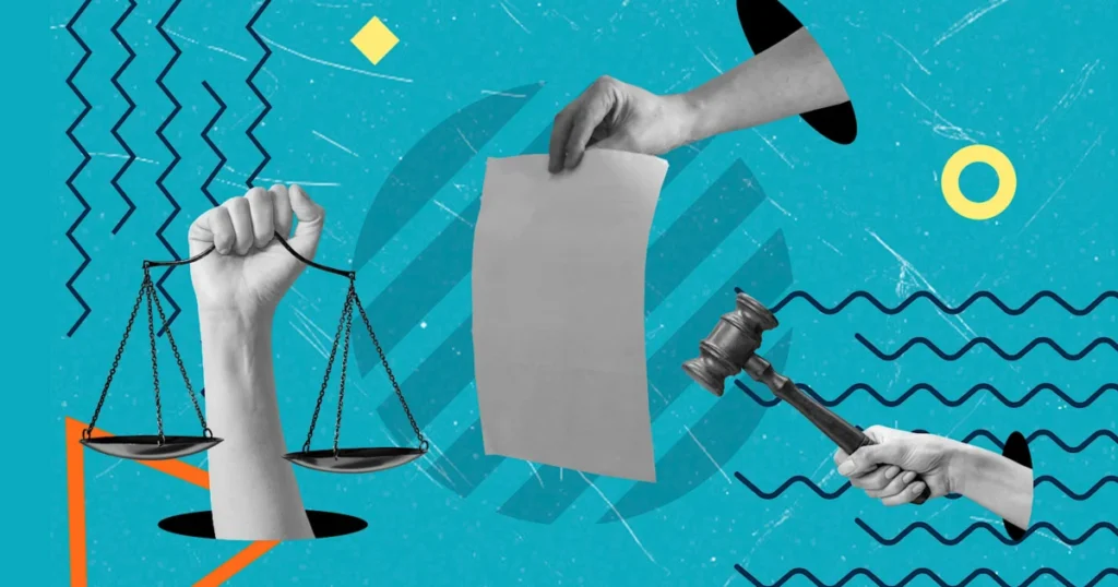 Hands,Are,Shown,Holding,A,Scale,And,A,Gavel,While