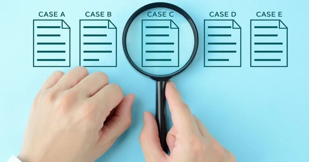 Human's,Hand,Using,Magnifying,Glass,And,Report,Pictogram,With,Case