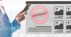 A,Businessman,Engages,With,A,Mobile,Device,To,Manage,Copyright